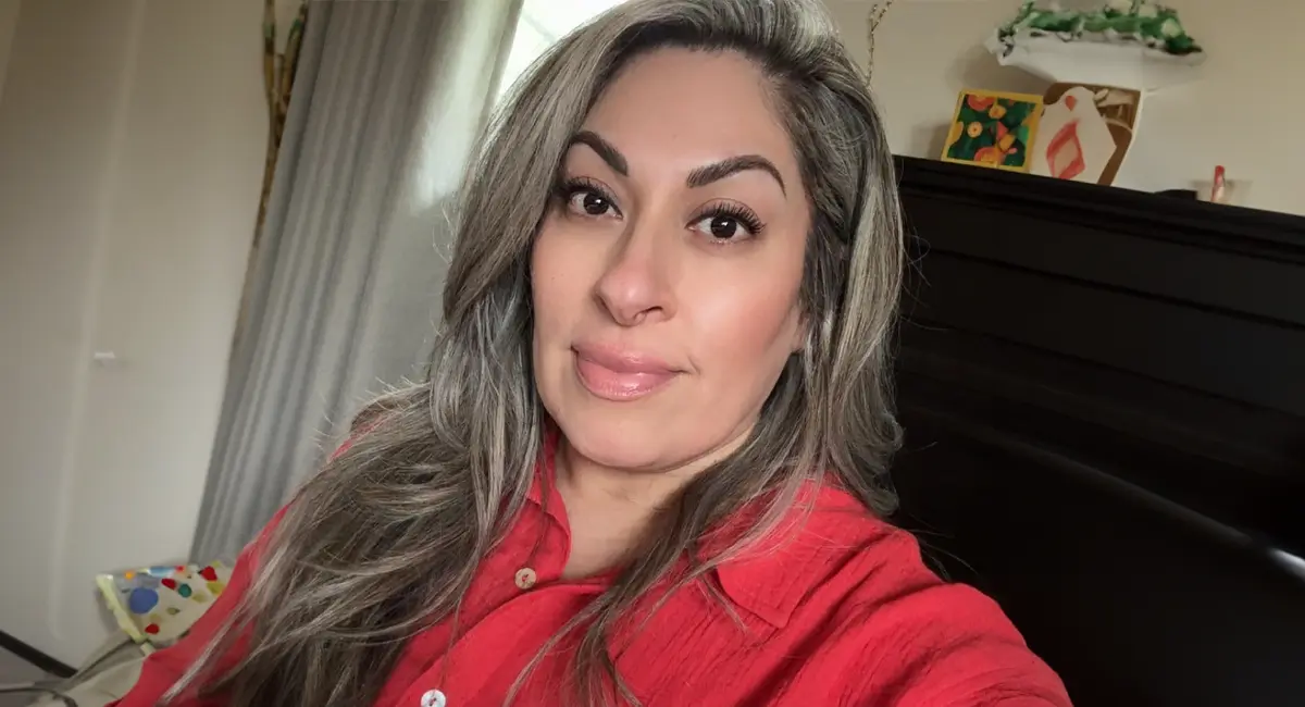 Leticia Zesati, candidate for Sunnyside City Council District 1, wearing a red blouse